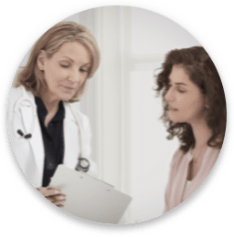 Healthcare provider and patient reviewing chart