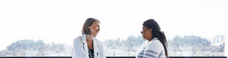 Doctor Patient Hero Banner actor portrayal of female doctor speaking with female patient