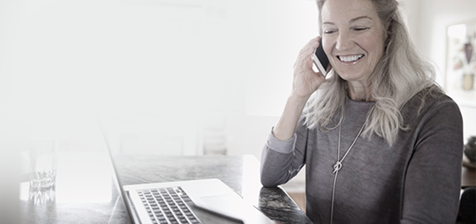 actor portrayal of woman on the phone and on the computer